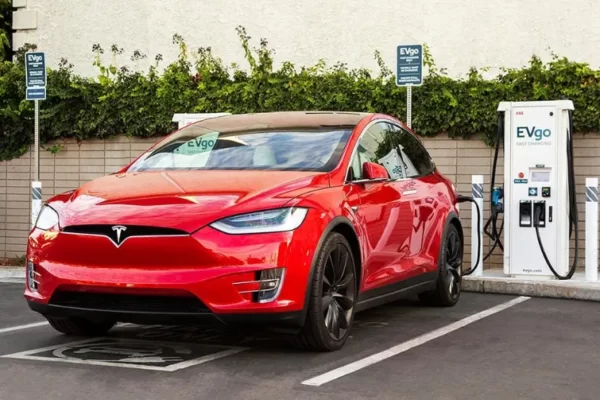 Teslas will soon be compatible with EVgo charging stations across the US -  CNET